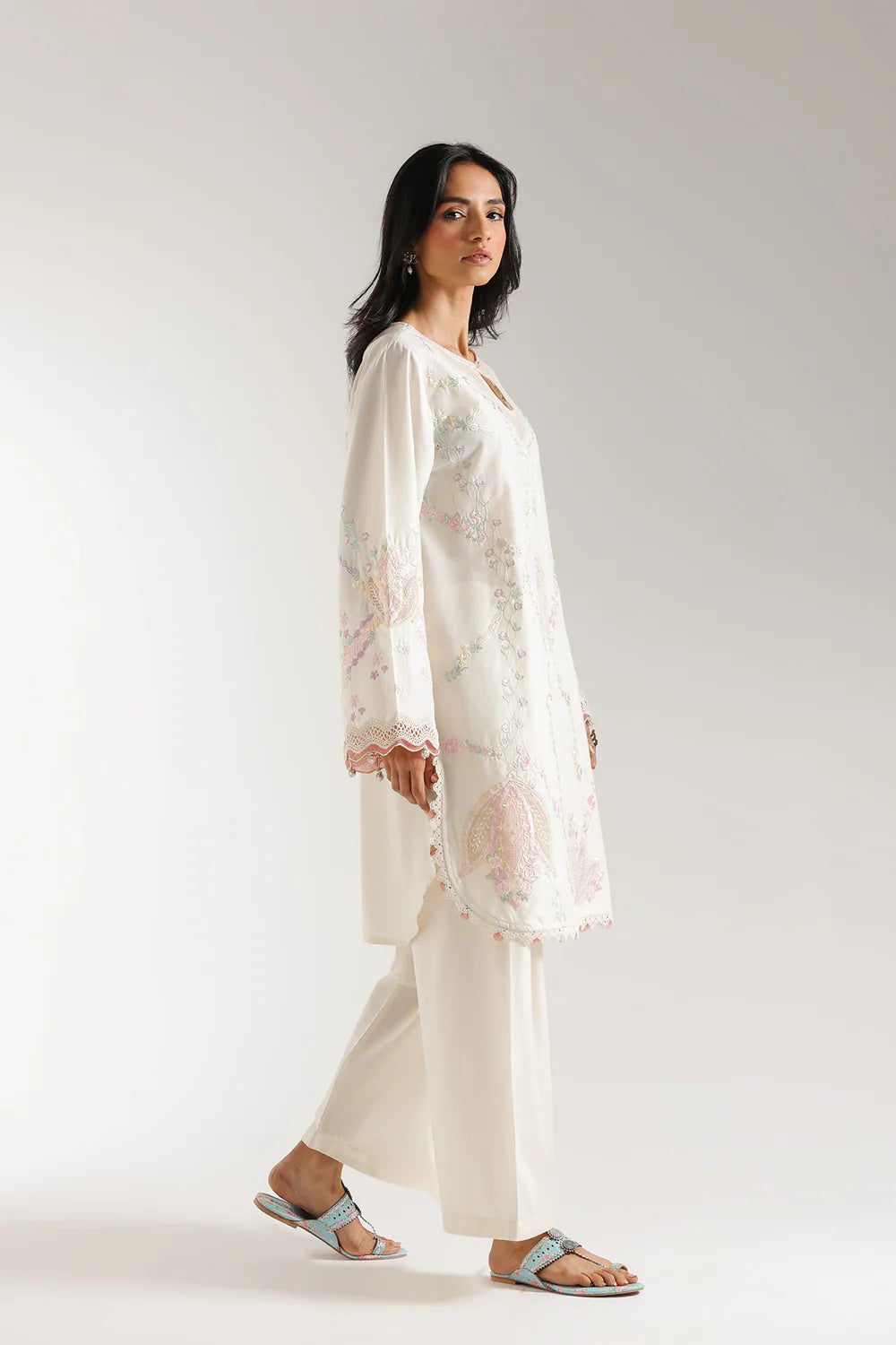 Off white embroidered lawn suit