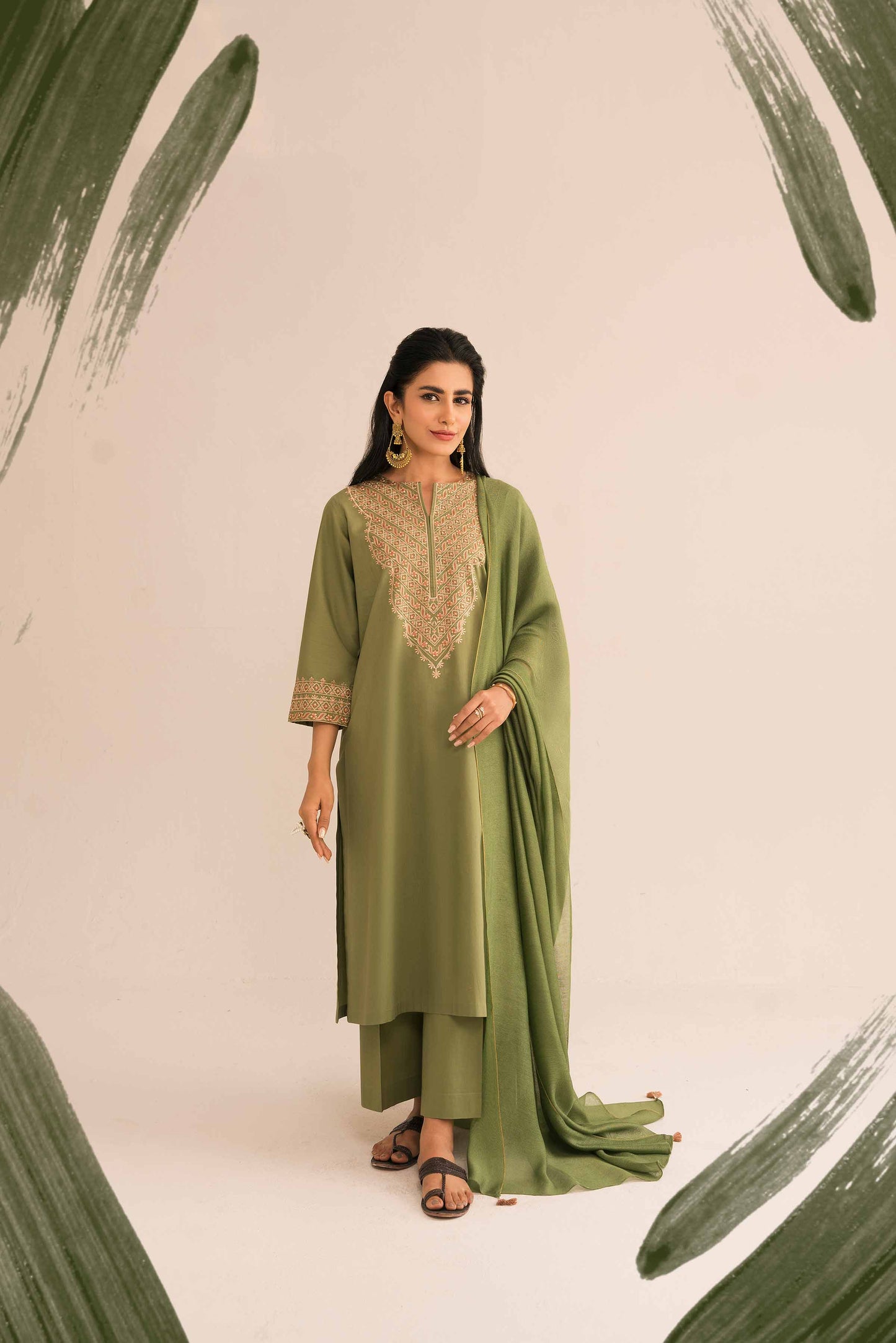 Green embroidered cambric suit